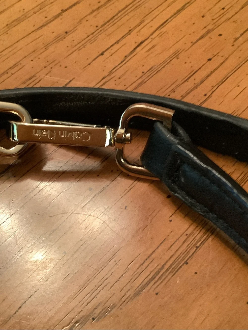 Calvin Klein Gold and Black Purse Strap with goldstone clips.